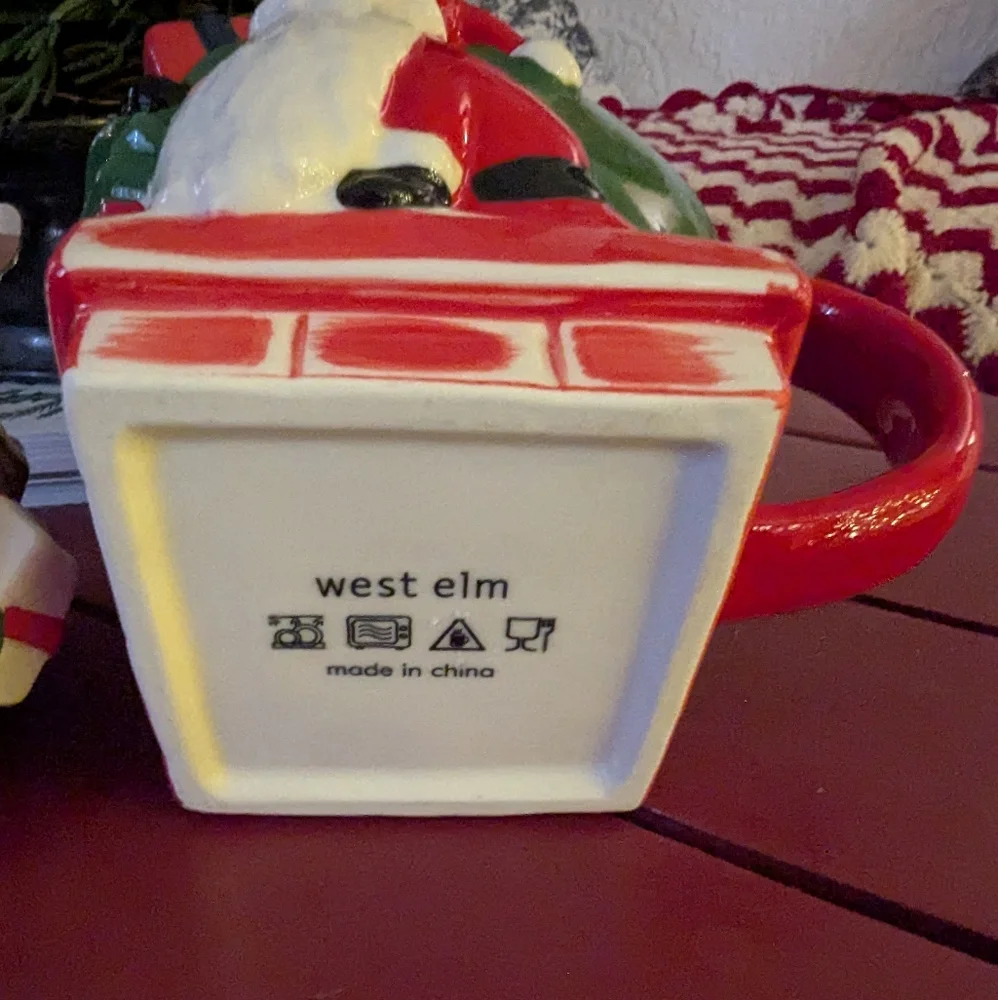 West Elm figural covered mug Santa with a sack